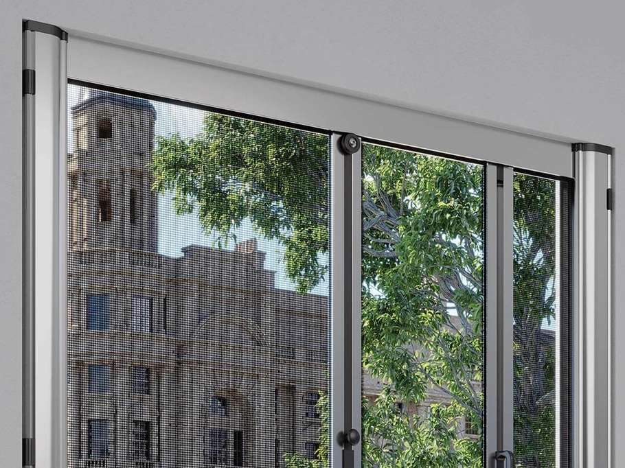 Zanzariera a rullo laterale doppia a molla in alluminio con cassonetto arrotondato di Pronema